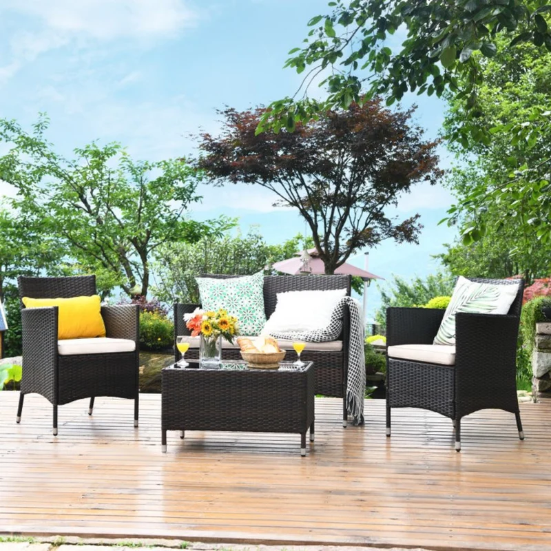 4-Piece Outdoor Wicker Conversation Furniture Set with Beige Cushions and Tempered Glass Table