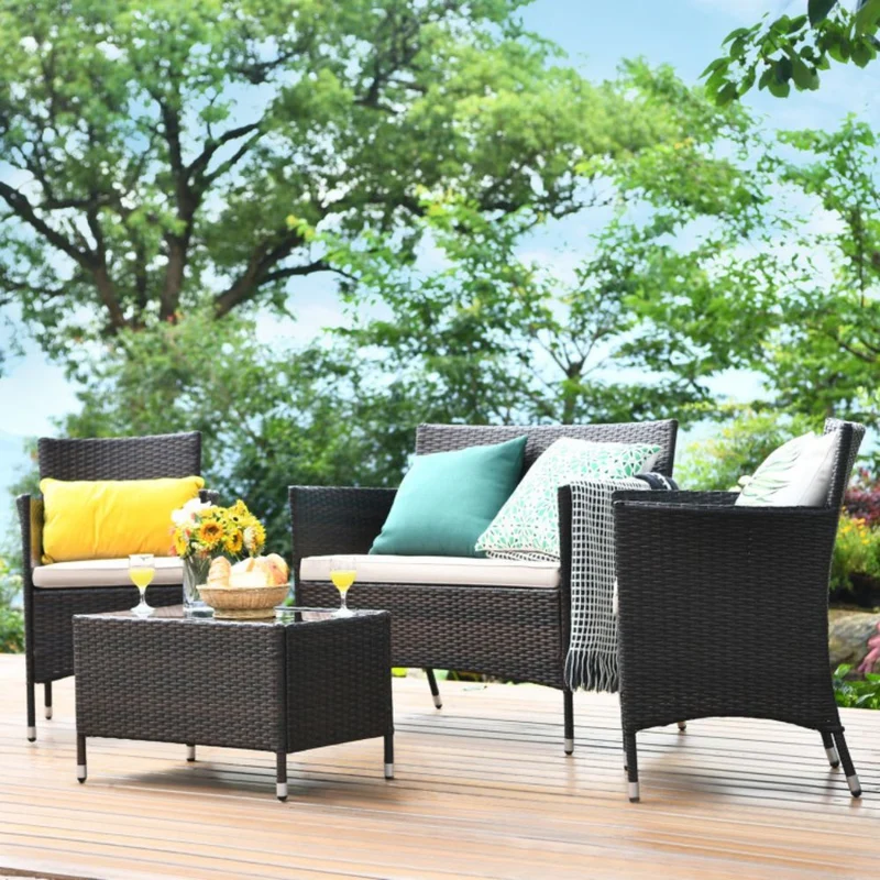 4-Piece Outdoor Wicker Conversation Furniture Set with Beige Cushions and Tempered Glass Table
