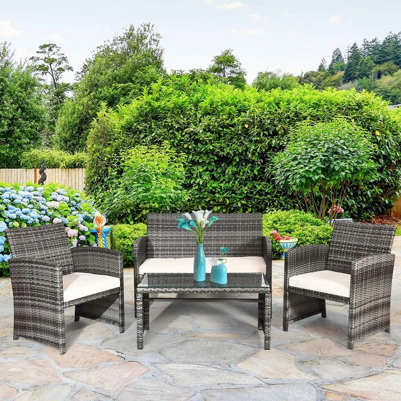 4-Piece Outdoor Wicker Conversation Furniture Set with White Cushions and Tempered Glass Table
