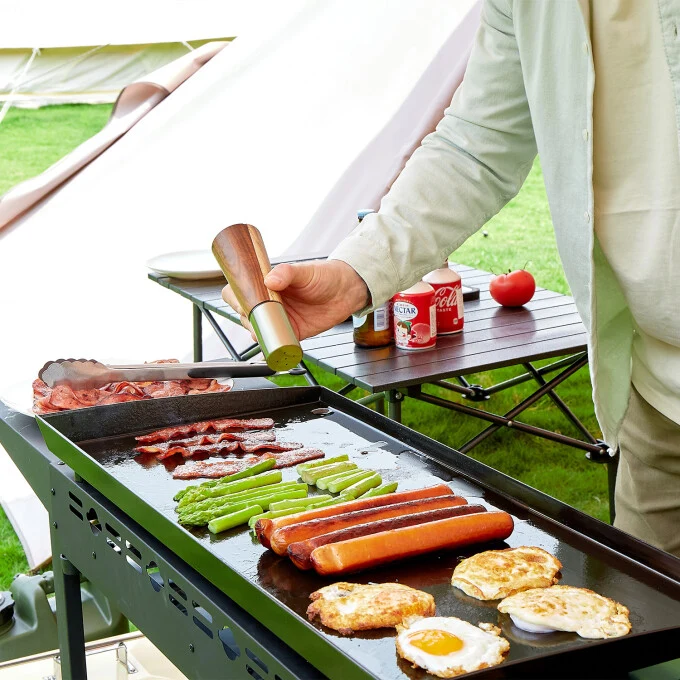 4-Burner Portable Propane Gas Grill in Black with Griddle Top