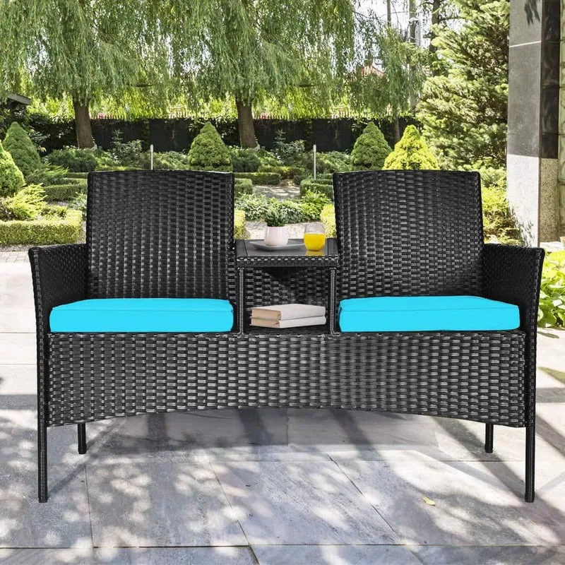 Black Wicker Outdoor Loveseat with Turquoise Cushions and Center Tea Table