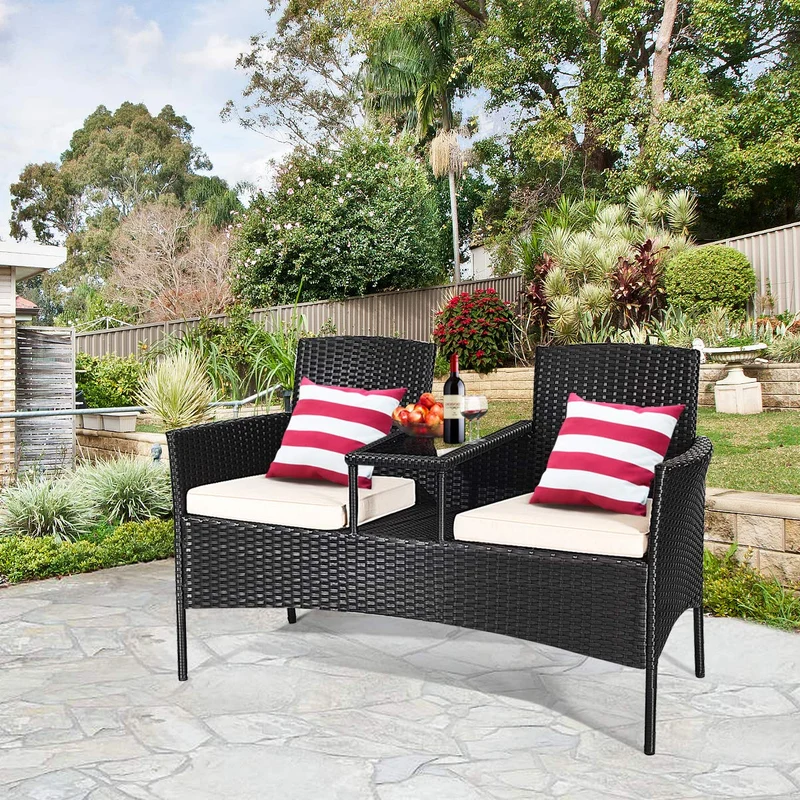 Black Wicker Outdoor Loveseat with White Cushions and Center Tea Table
